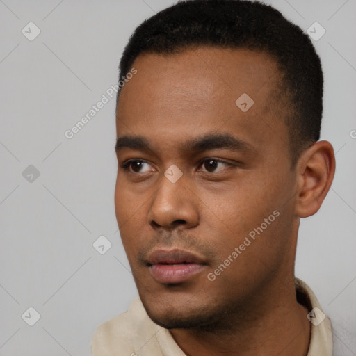 Neutral latino young-adult male with short  black hair and brown eyes