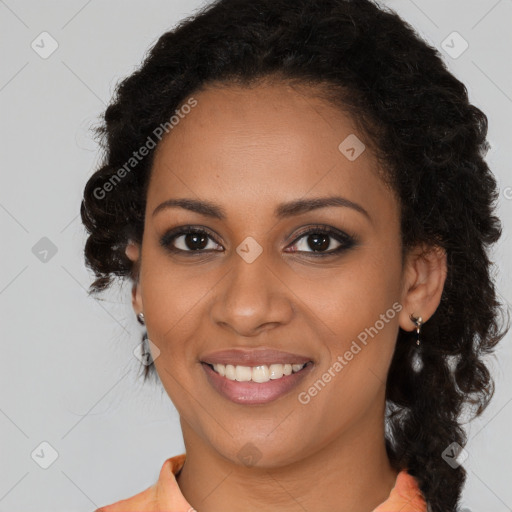 Joyful black young-adult female with long  brown hair and brown eyes