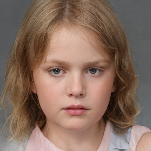 Neutral white child female with medium  brown hair and grey eyes