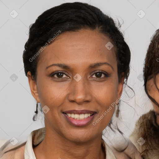 Joyful latino young-adult female with medium  brown hair and brown eyes