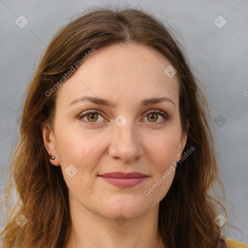 Joyful white adult female with long  brown hair and brown eyes