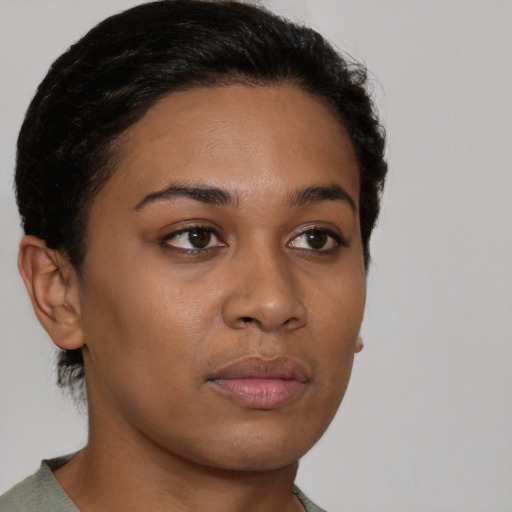 Neutral latino young-adult female with short  brown hair and brown eyes