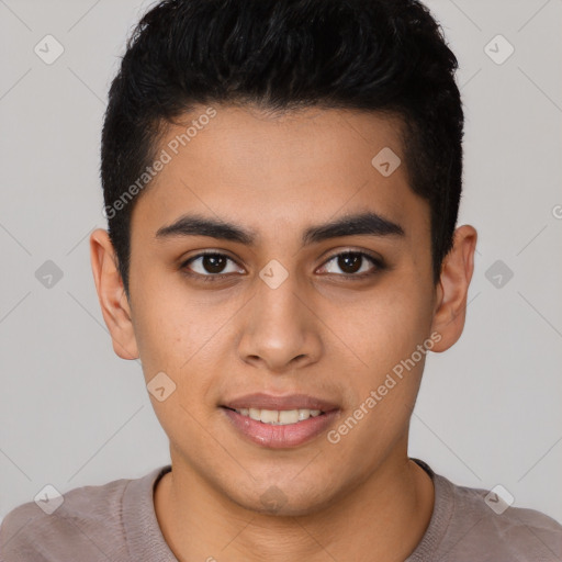 Joyful latino young-adult male with short  black hair and brown eyes