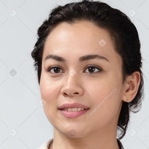 Joyful white young-adult female with medium  black hair and brown eyes