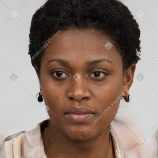 Neutral black young-adult female with short  brown hair and brown eyes