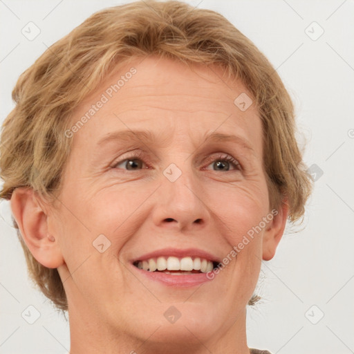 Joyful white adult female with medium  brown hair and green eyes