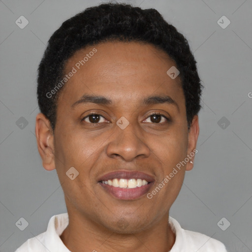 Joyful latino young-adult male with short  brown hair and brown eyes