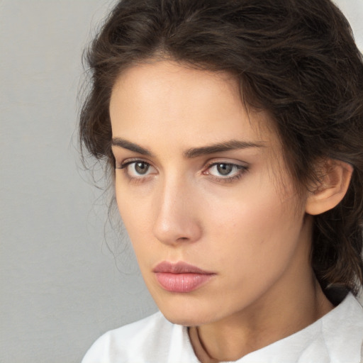 Neutral white young-adult female with medium  brown hair and brown eyes