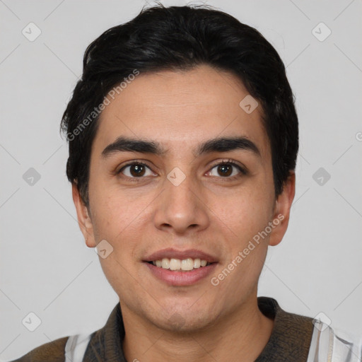 Joyful white young-adult male with short  black hair and brown eyes