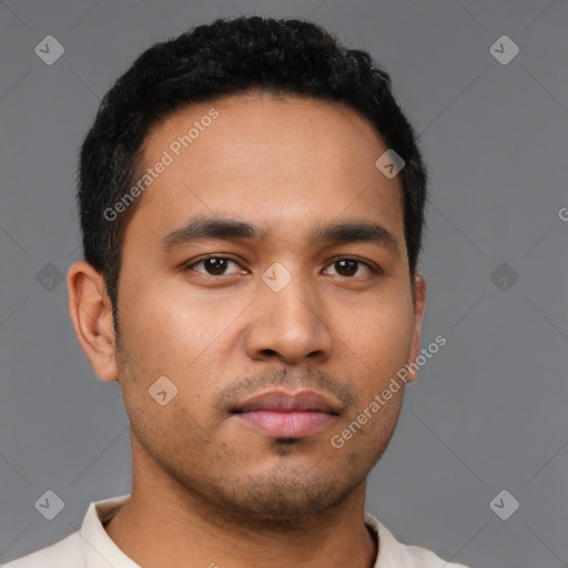 Neutral latino young-adult male with short  black hair and brown eyes