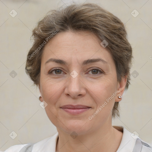 Joyful white adult female with short  brown hair and brown eyes