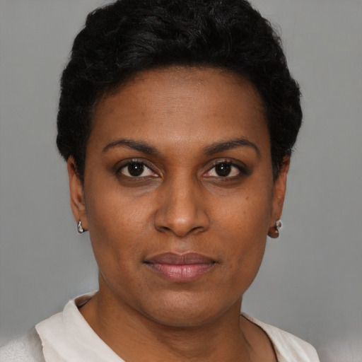Neutral black young-adult female with short  black hair and brown eyes