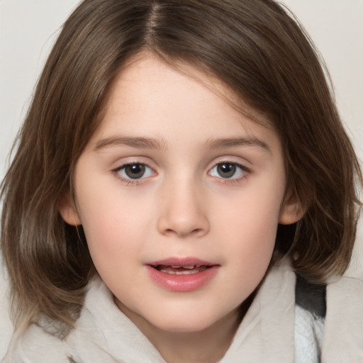 Joyful white child female with medium  brown hair and brown eyes