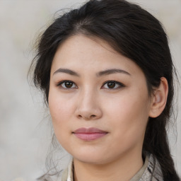 Joyful asian young-adult female with long  brown hair and brown eyes