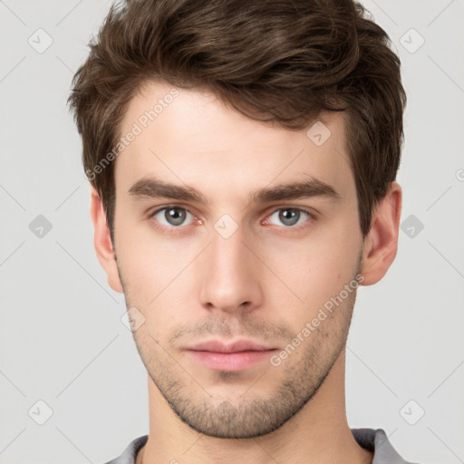 Neutral white young-adult male with short  brown hair and brown eyes