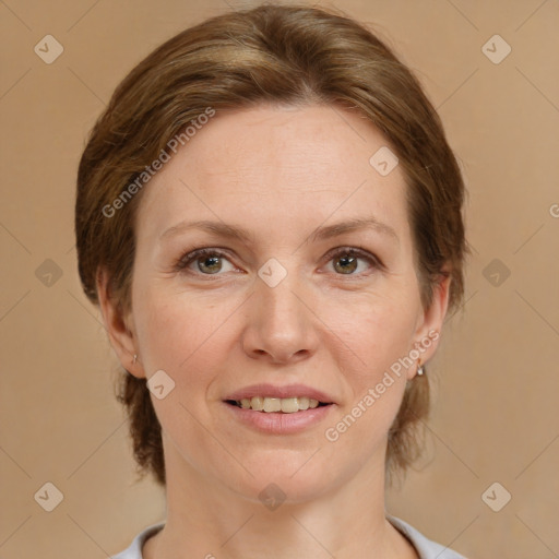 Joyful white adult female with medium  brown hair and brown eyes