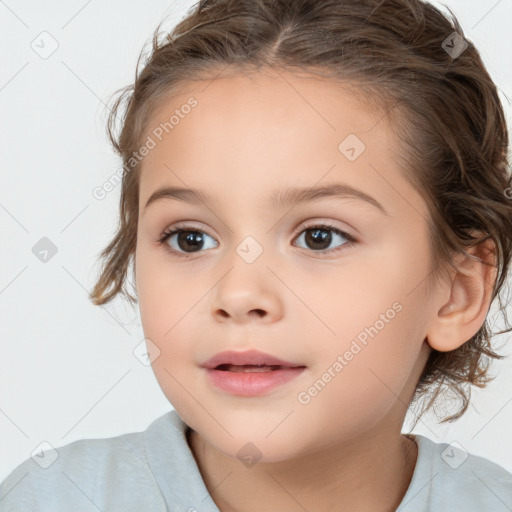 Joyful white child female with medium  brown hair and brown eyes