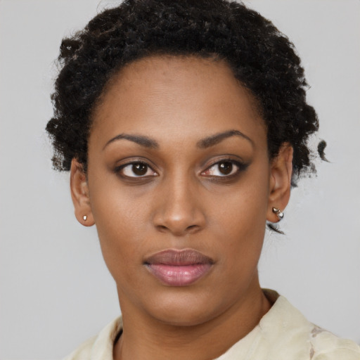 Neutral black young-adult female with short  brown hair and brown eyes
