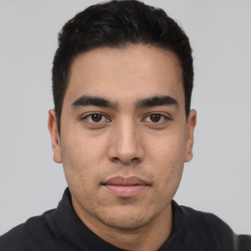 Neutral white young-adult male with short  black hair and brown eyes