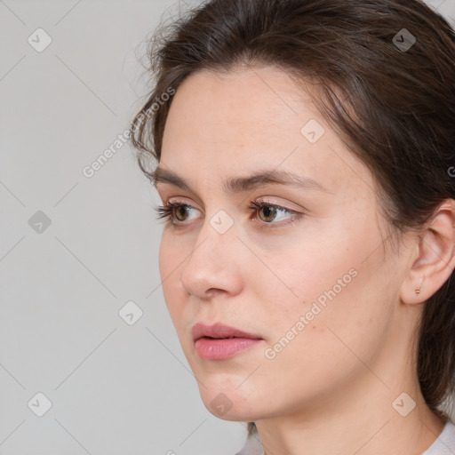 Neutral white young-adult female with medium  brown hair and brown eyes