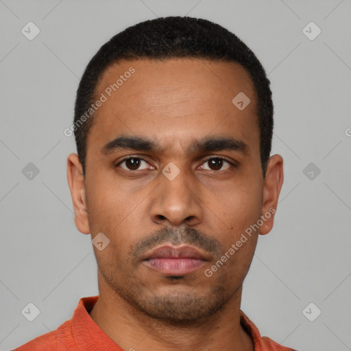 Neutral latino young-adult male with short  black hair and brown eyes