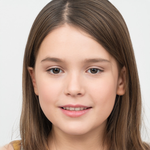 Joyful white child female with long  brown hair and brown eyes