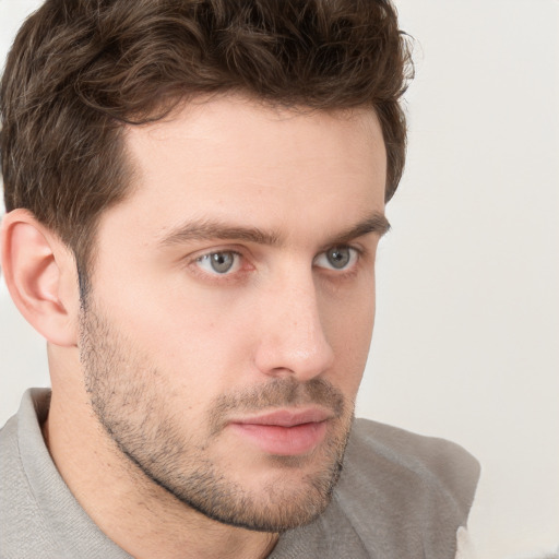 Neutral white young-adult male with short  brown hair and grey eyes