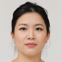 Neutral asian young-adult female with medium  black hair and brown eyes