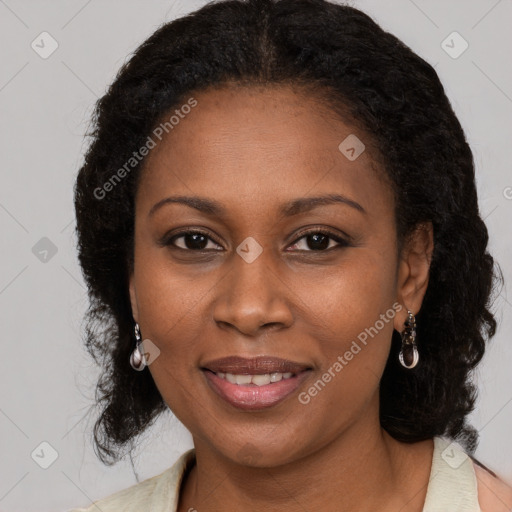 Joyful black young-adult female with medium  black hair and brown eyes