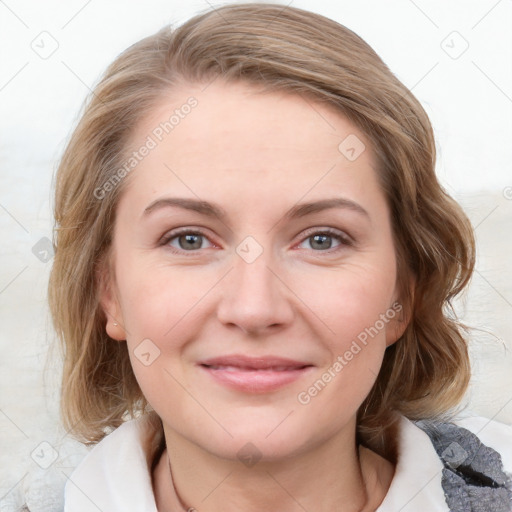 Joyful white young-adult female with medium  brown hair and blue eyes