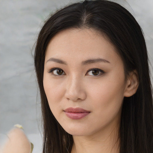 Neutral asian young-adult female with long  brown hair and brown eyes