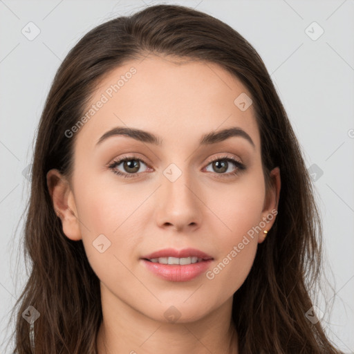 Neutral white young-adult female with long  brown hair and brown eyes