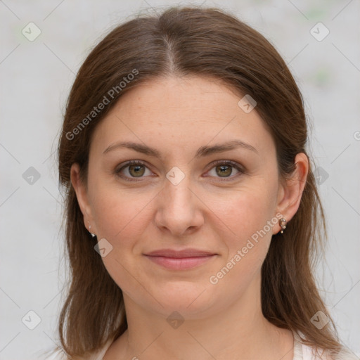 Joyful white young-adult female with medium  brown hair and grey eyes