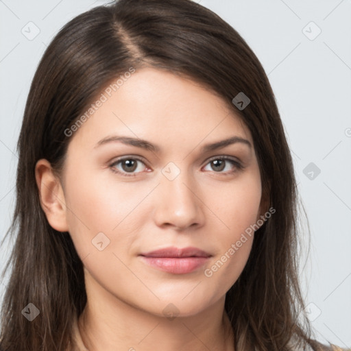 Neutral white young-adult female with long  brown hair and brown eyes