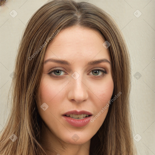 Joyful white young-adult female with long  brown hair and green eyes