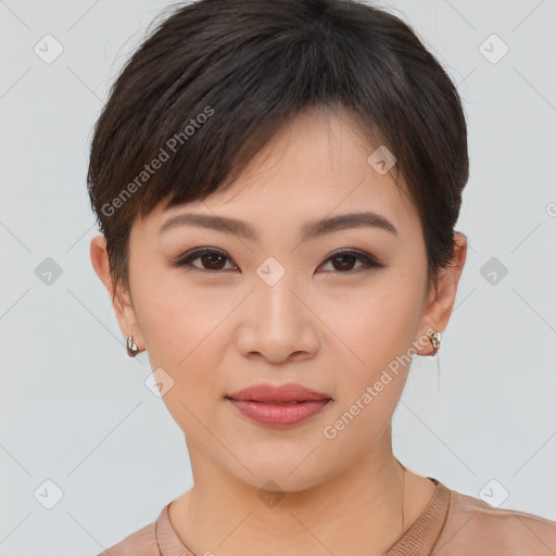 Joyful asian young-adult female with short  brown hair and brown eyes