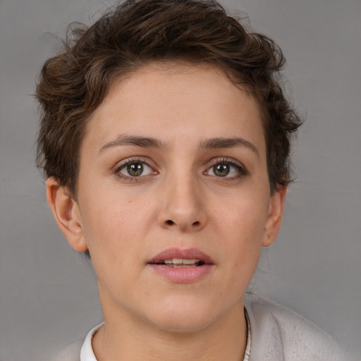 Neutral white young-adult female with short  brown hair and brown eyes