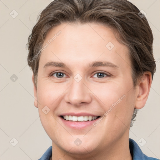 Joyful white young-adult female with short  brown hair and grey eyes