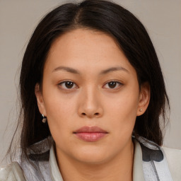 Neutral asian young-adult female with medium  brown hair and brown eyes