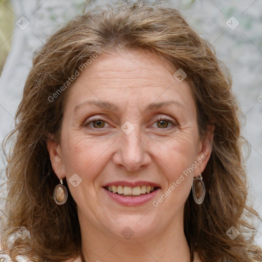 Joyful white adult female with long  brown hair and grey eyes