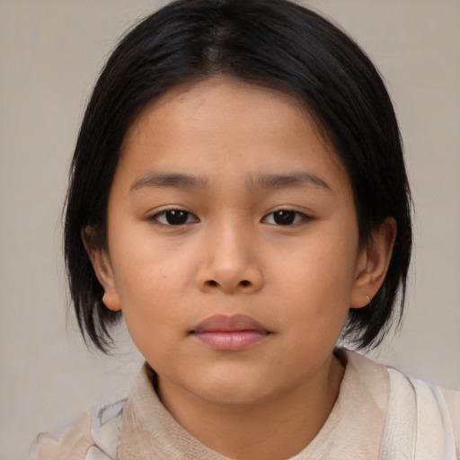 Neutral asian child female with medium  brown hair and brown eyes