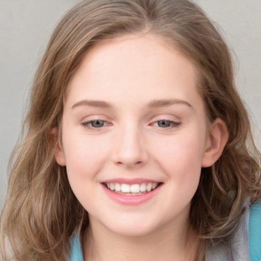 Joyful white young-adult female with long  brown hair and blue eyes