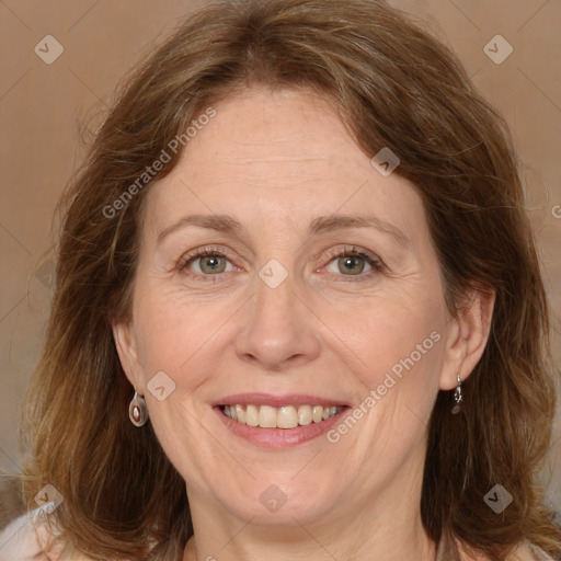 Joyful white adult female with medium  brown hair and grey eyes