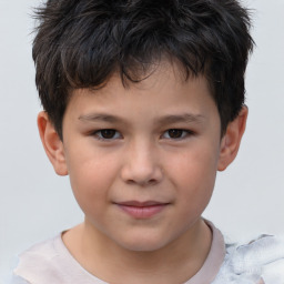 Joyful white child male with short  brown hair and brown eyes