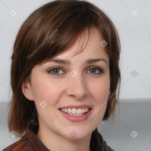 Joyful white young-adult female with medium  brown hair and blue eyes