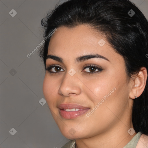 Joyful latino young-adult female with medium  brown hair and brown eyes