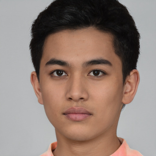 Neutral latino young-adult male with short  brown hair and brown eyes