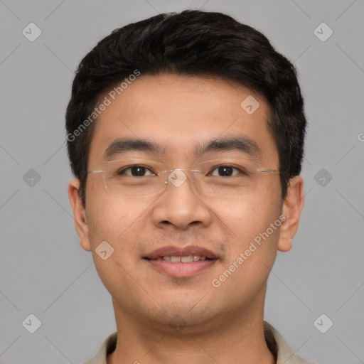 Joyful white young-adult male with short  black hair and brown eyes