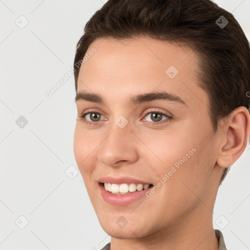 Joyful white young-adult female with short  brown hair and brown eyes