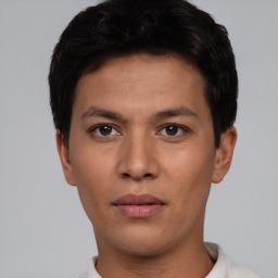 Neutral white young-adult male with short  black hair and brown eyes